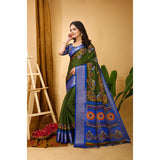 Mehendi-colored soft Dola cotton kalamkari printed saree with unstitched blouse, vibrant Indian traditional attire on mannequin