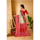 White soft Dola cotton kalamkari printed saree with unstitched blouse, traditional Indian bridal wear on mannequin