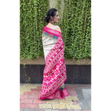 White soft Dola cotton Kalamkari printed saree with unstitched blouse, traditional Indian women's attire on mannequin