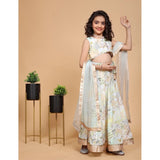 Green chiffon printed lehenga choli set for girls, sleeveless round neck traditional Indian outfit on display