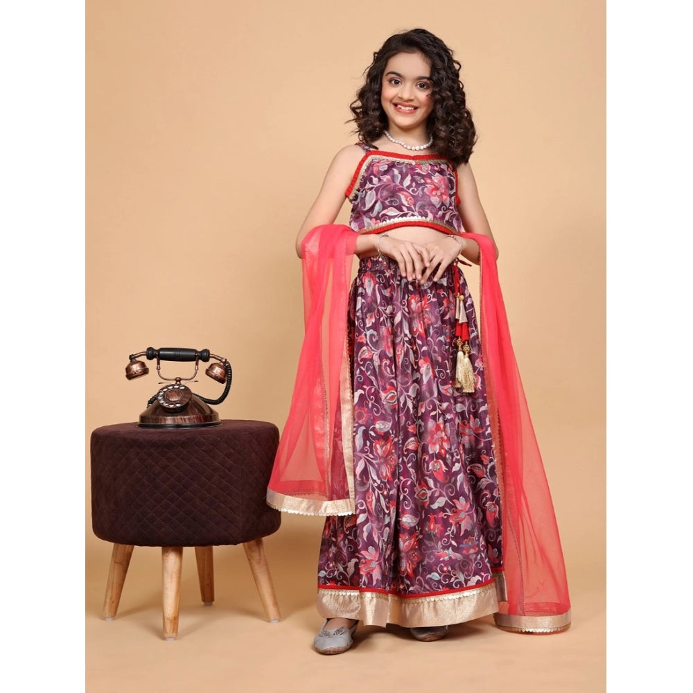 Maroon chiffon printed lehenga choli set for girls, sleeveless v-neck traditional Indian attire on display