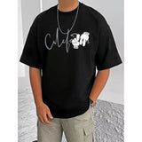 Black cotton blend men's t-shirt with printed round neck and half sleeves