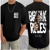 Black cotton blend men's t-shirt with printed round neck and half sleeves, casual wear on model