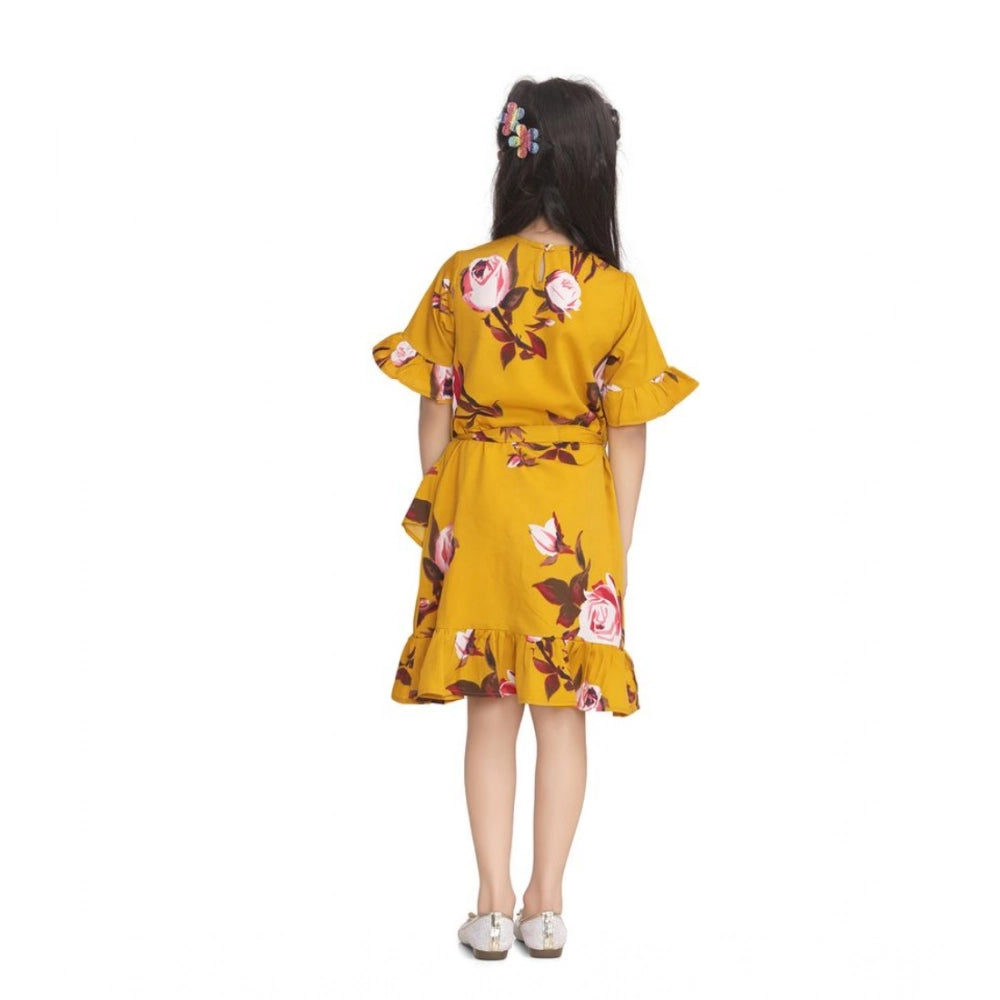 Mustard polyester crepe floral printed cold shoulder round neck dress for girls, knee length style on model
