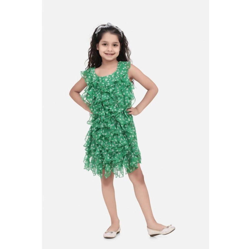 Green chiffon ruffled sleeveless round neck dress for girls, above knee length on model