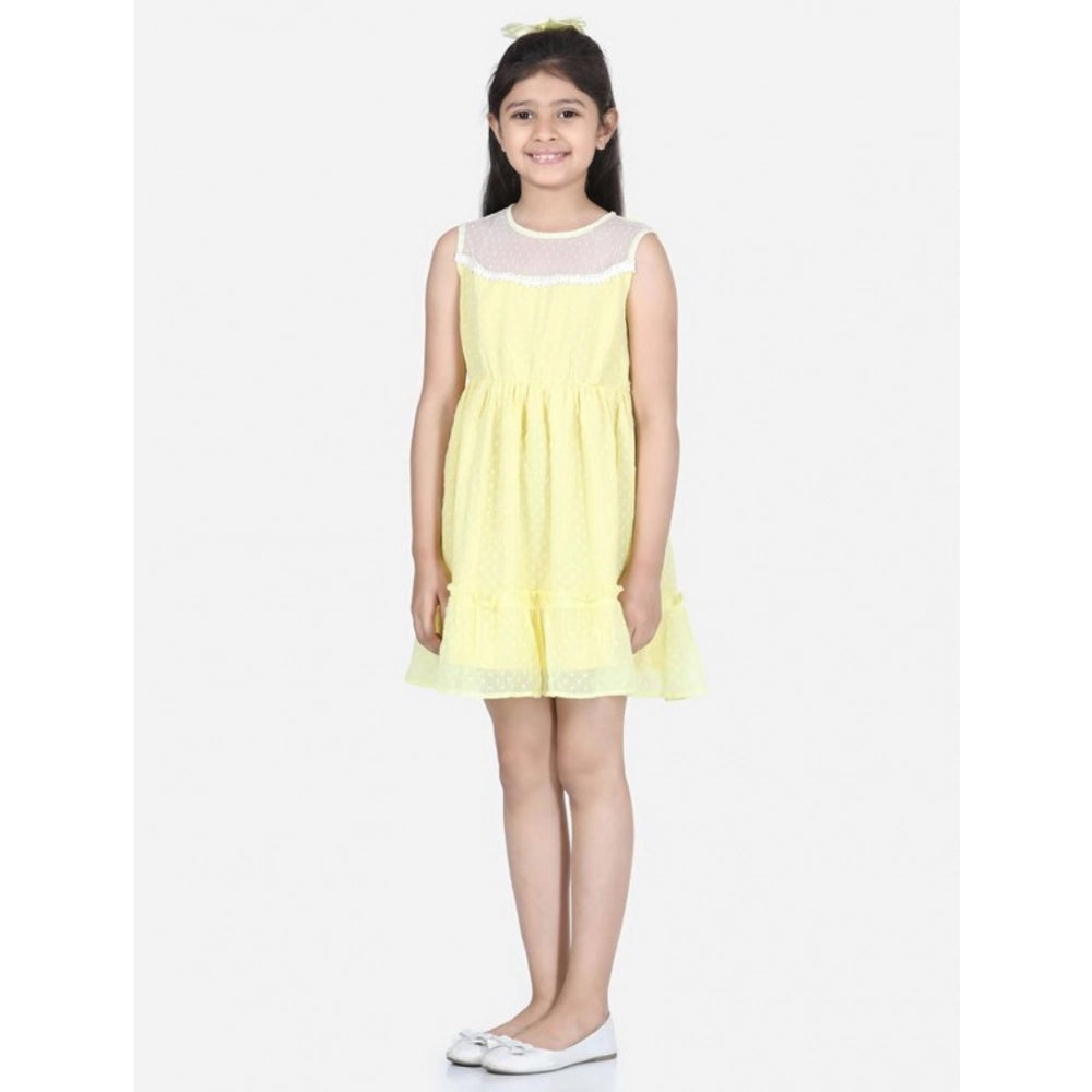 Yellow polyester dobby floral printed sleeveless round neck dress for girls