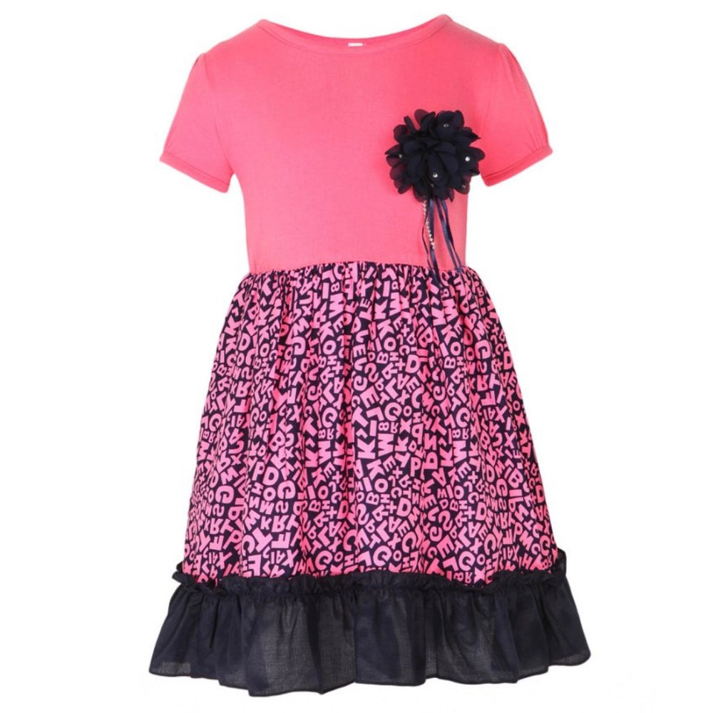 Pink polyester crepe embellished short sleeve round neck dress for girls, stylish fashion accessory on a mannequin