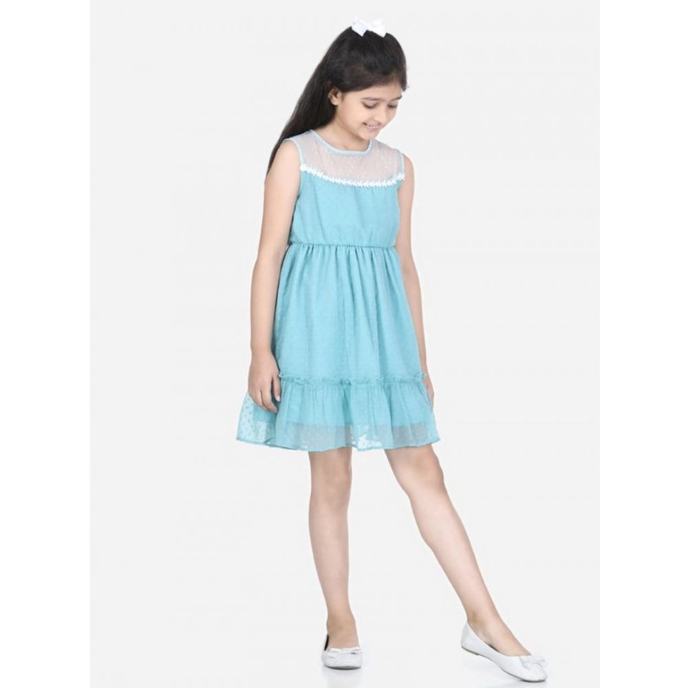 Blue polyester dobby floral printed sleeveless round neck dress for girls, vibrant floral pattern in a casual above-knee length style