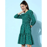 Green women's dress with moss polka dot pattern, round neck and short sleeves