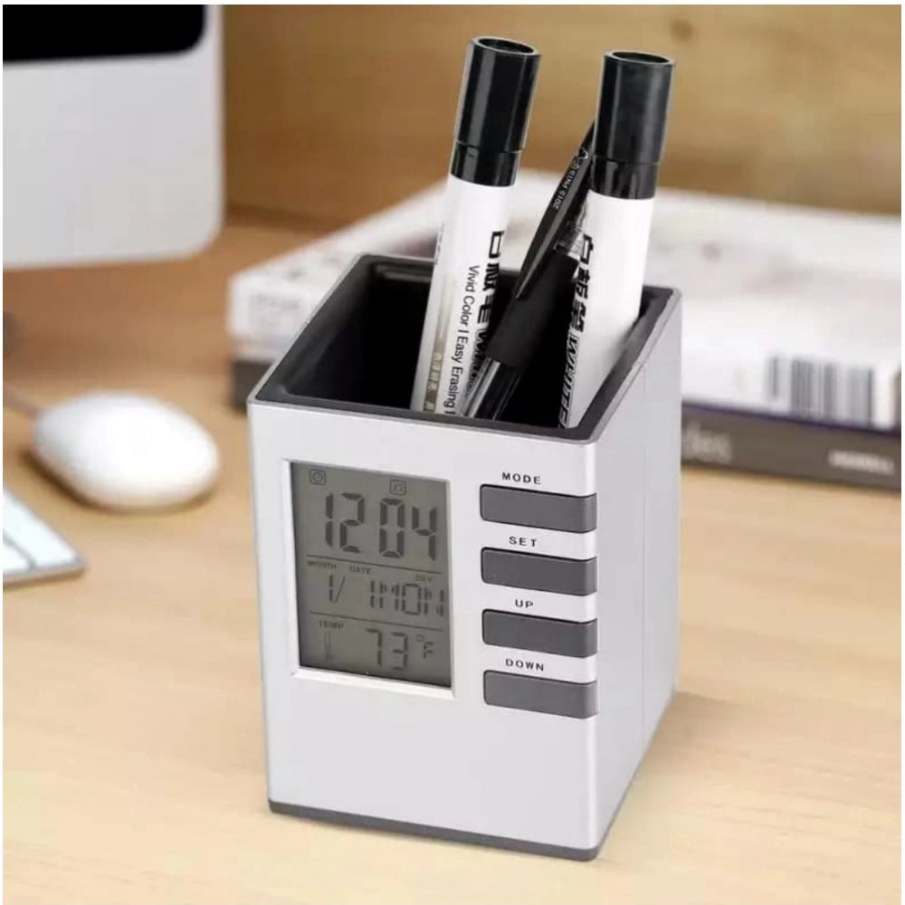 Plastic pen holder with LCD digital alarm clock, ideal for office desk organization