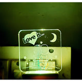 A blue night lamp with a white and orange starfish design