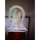 Black AC adapter night lamp with heart shaped cutout and LED light