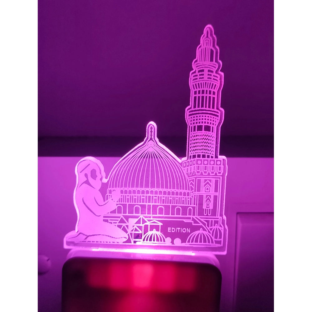 The Islamic night lamp, black metal with an illustration of a mosque and a person in prayer