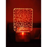 Black, glowing ac adapter with "GOOD NIGHT" written on it
