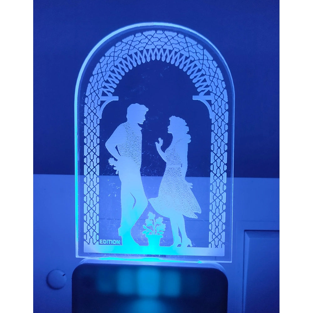 White and blue night lamp with an ac adapter design featuring a romantic couple