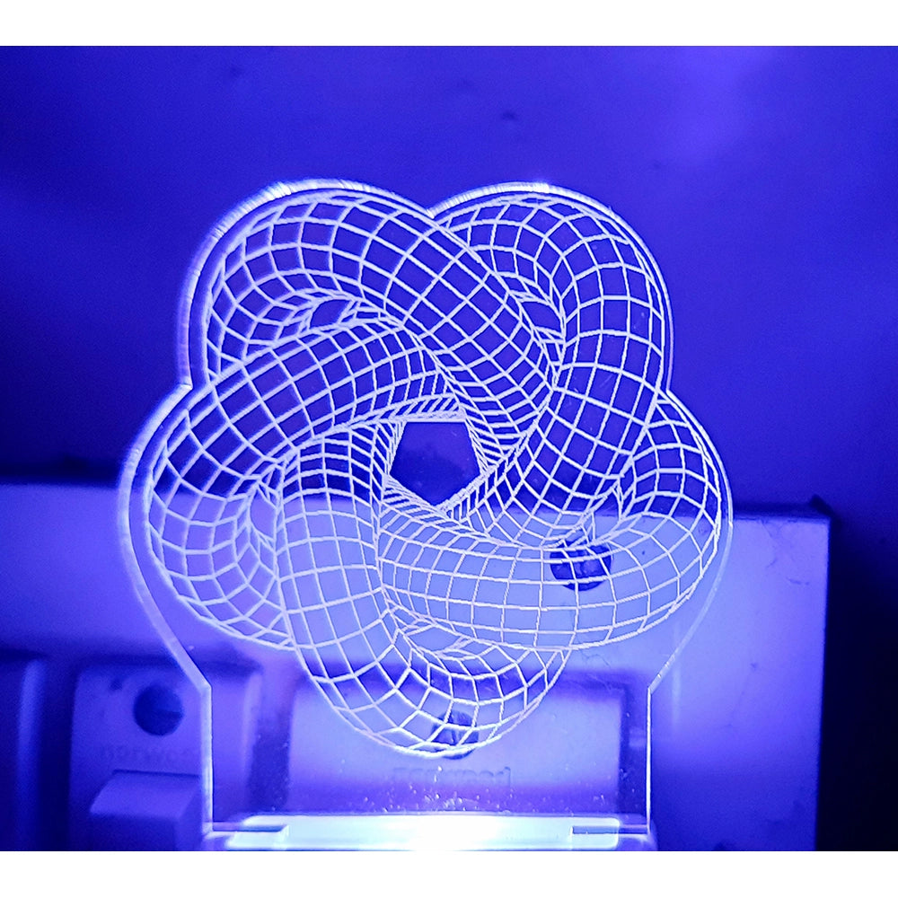 Night lamp with intricate laser-designed star and AC adapter design, clear plastic body