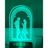 Black and white night lamp with glowing couple, metal base