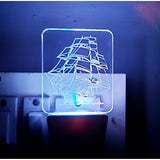 LED night lamp shaped like a sailboat, with an AC adapter for illumination