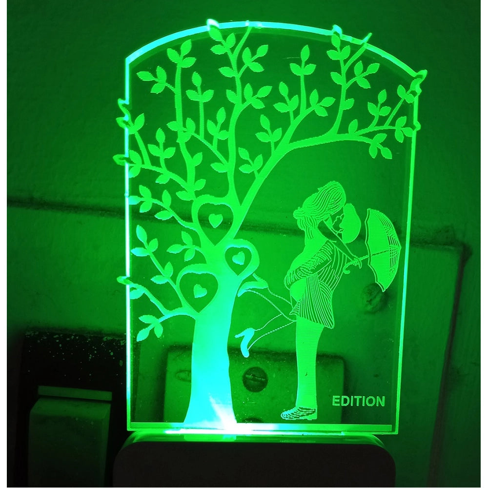 Glowing night lamp with romantic couple motif, LED bulb illuminated