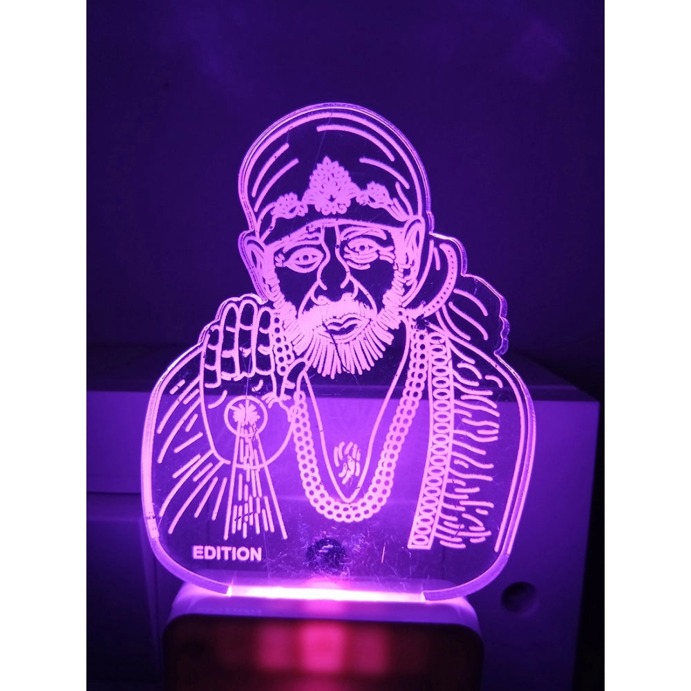 Purple lamp with an AC adapter, illuminating a night light, featuring the image of Sai Baba