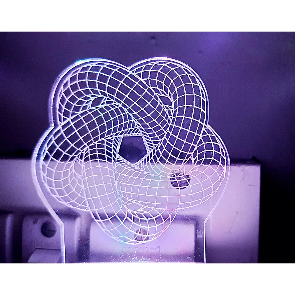 Laser cut metal lamp with star design and white ac adapter
