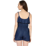 Blue denim jumpsuit with ruffled shoulder straps
