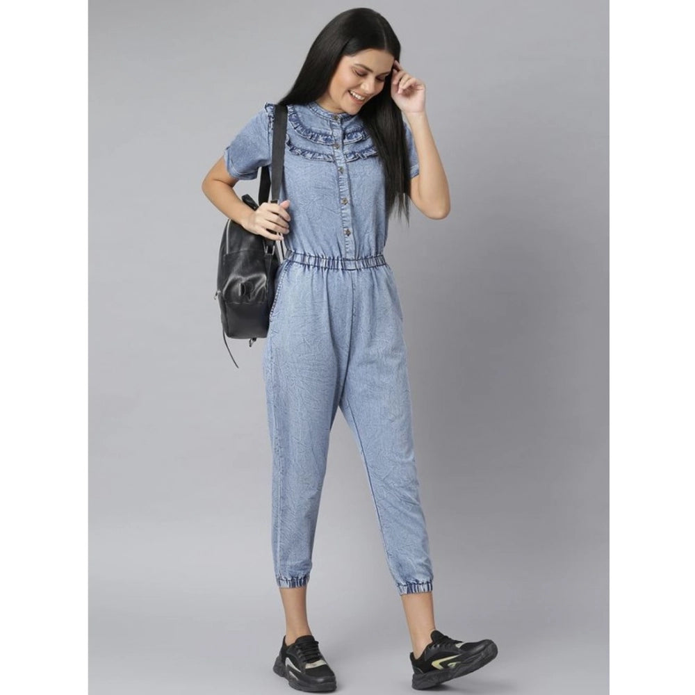 Blue denim jumpsuit with tie waist