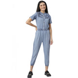 Women's blue denim jumpsuit with tie waist