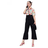 Printed multicolor polyester women's jumpsuit with 3/4 length sleeves and flared pants. Black belt at waist