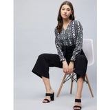 Women's black short sleeve jumpsuit with animal print pattern