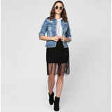 Women's blue denim jacket with distressed details, long sleeves