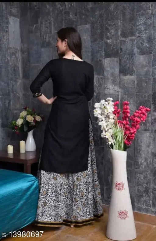Demirner black rayon kurta-skirt ethnic set, solid net Indian traditional wear with three-quarter sleeves