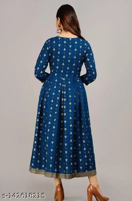 Dark blue long-sleeve dress with a high neck and embroidered stars