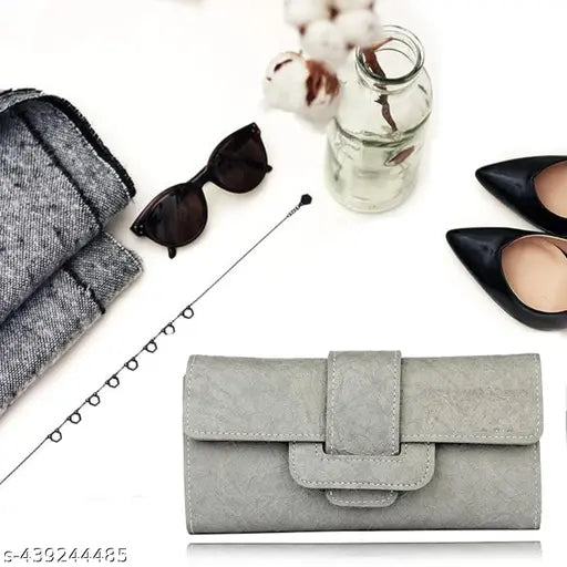 Gray leather clutch wallet with flap closure