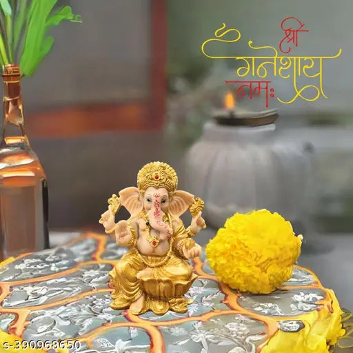 Golden poly resin Ganesha idol, Hindu God for prosperity and blessings (L8 x B6 x H14.5 CM)