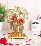 Metal Radha Krishna statue, standing under tree & playing flute, 21 cm (Gold plated)