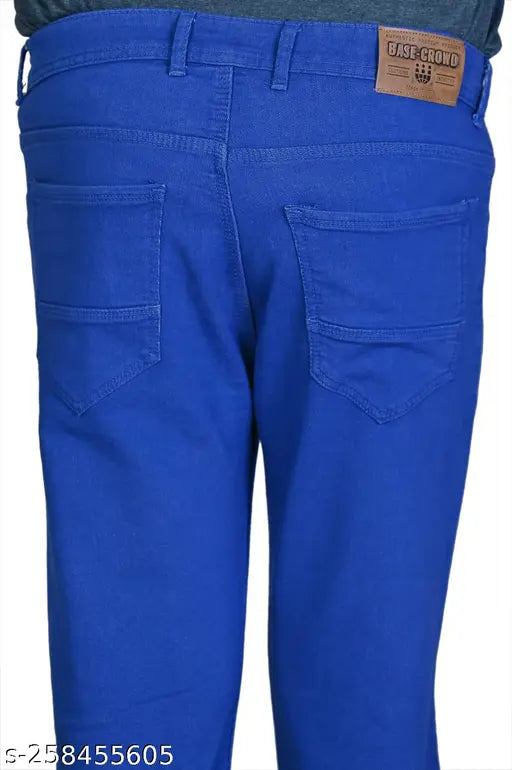 Men's black denim jeans, solid fit and style in royal blue color, available in sizes 28-40, on clothing rack