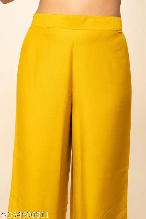 Yellow silk blend straight kurta with palazzo and dupatta, featuring a sleeveless round neck and suitable for festive occasions. Indian-made, available in sizes S-XXL