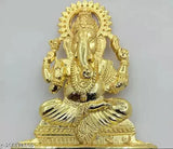 Golden plated Ganesh idol, premium metal statue for home decor or temple, intricately designed Indian artwork