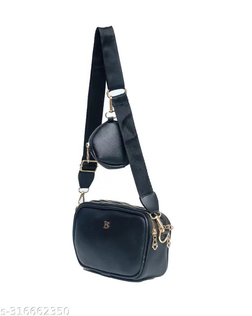 Black leather crossbody sling bag with two compartments and a shoulder strap