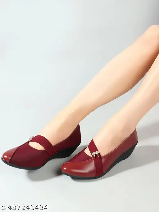 Maroon flat shoes, black bow detail