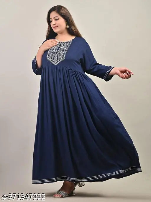 Plus-size rayon long gown, embroidered net pattern, three-quarter sleeves. Comfortable and stylish plus size dress from India." (97 characters)