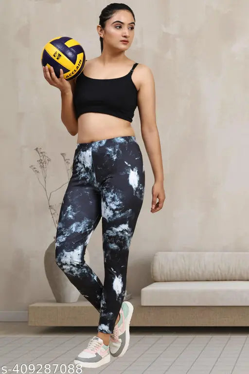 Multicolor printed net Lycra jeggings for women's fitness, yoga, gym wear. Comfortable waist and full-length bottom. Made in India