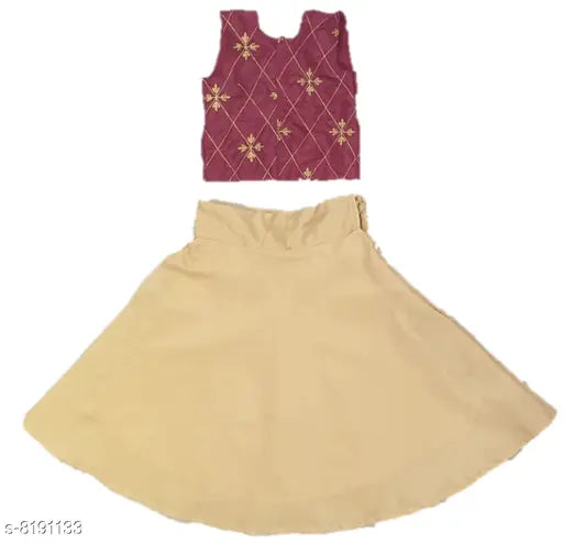 Kids silk blend golden and maroon ethnic wear lehenga choli, embellished with intricate embroidery. [1-2 Years: 24in x 20in, 3-4 Years: 26in x 23in, 4-5 Years: 28in x 25in, 6-7 Years: 30in x 27in]. Indian traditional outfit on display