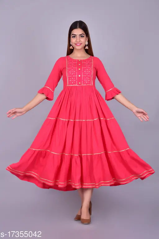 Embroidered rayon blend straight kurta for women, three-quarter sleeve Indian fashion on mannequin