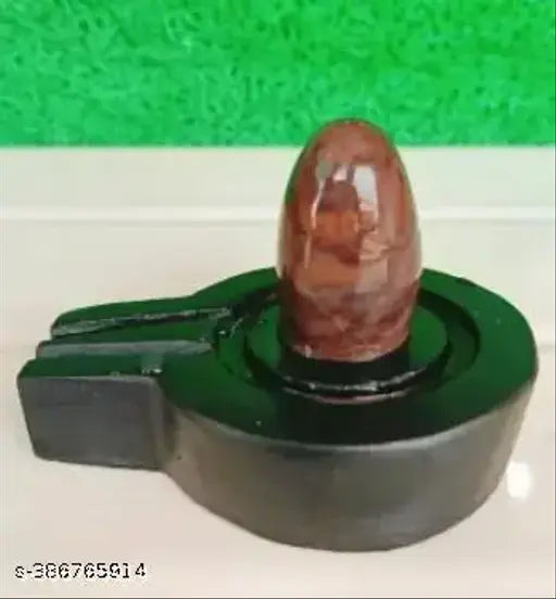 Artificial Shivling, black base, with yoni form