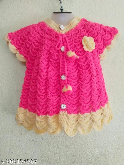Hand knitted baby girl's woolen sleeveless sweater for winter, printed net pattern. High quality, round neck, and regular fit. Made in India