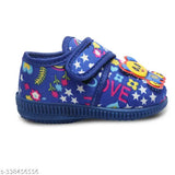 Blue, pink and yellow stars patterned baby shoes with velcro closure