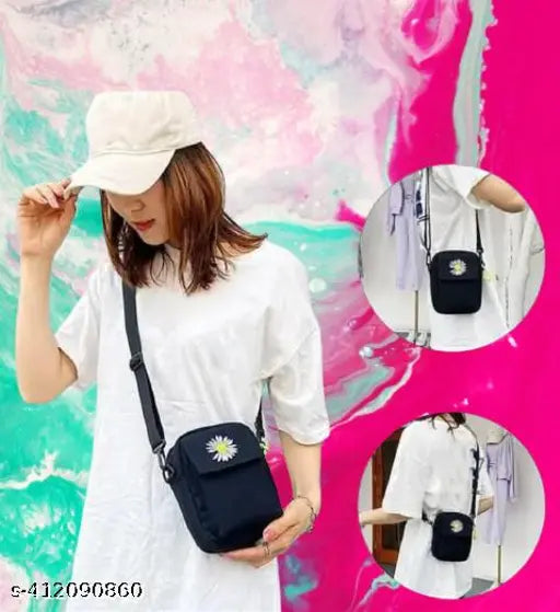 Black crossbody bag with a floral design, zip closure, and multiple pockets