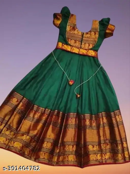 South Indian silk kurti gown for girls, traditional full-length maxi dress in self-design net. Silk fabric with short sleeves, perfect for kids and teenagers